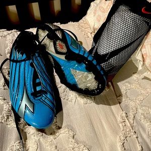 Brand new soccer shoes and shin guards